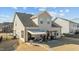 Spacious backyard with patio, pergola, and grill at 2120 Blue Iris Way, Zebulon, NC 27597