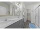Elegant bathroom with double sinks and a large walk-in shower at 2120 Blue Iris Way, Zebulon, NC 27597