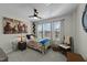 Charming bedroom with twin bed, ceiling fan, and plenty of light at 2120 Blue Iris Way, Zebulon, NC 27597