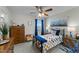 Cozy bedroom with a comfortable bed and plenty of closet space at 2120 Blue Iris Way, Zebulon, NC 27597