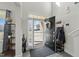 Bright and spacious entryway with a modern coat rack and globe at 2120 Blue Iris Way, Zebulon, NC 27597