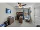 Bright home office with desk, chair, and ample storage at 2120 Blue Iris Way, Zebulon, NC 27597