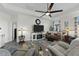 Relaxing living room with comfortable seating and a fireplace at 2120 Blue Iris Way, Zebulon, NC 27597