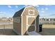 Large storage shed in the backyard at 2120 Blue Iris Way, Zebulon, NC 27597