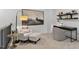 Home office in loft area with built-in shelving at 2332 Sugar Cone Way, Fuquay Varina, NC 27526