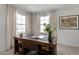 Spacious home office with large windows and built-in desk at 2332 Sugar Cone Way, Fuquay Varina, NC 27526