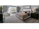 Main bedroom with king-size bed and gray walls at 2332 Sugar Cone Way, Fuquay Varina, NC 27526