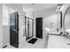 Modern bathroom with double vanity, large shower, and stylish fixtures at 257 Rawhide Dr, Louisburg, NC 27549