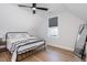 Cozy bedroom with hardwood floors and a ceiling fan at 257 Rawhide Dr, Louisburg, NC 27549