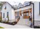 Stone steps leading to a double-door entryway with a wooden frame at 257 Rawhide Dr, Louisburg, NC 27549