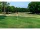 Scenic view of a lush green golf course at 257 Rawhide Dr, Louisburg, NC 27549