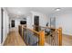 Upstairs hallway with hardwood floors and access to bedrooms at 257 Rawhide Dr, Louisburg, NC 27549