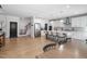 Open concept kitchen with island, stainless steel appliances, and white cabinets at 257 Rawhide Dr, Louisburg, NC 27549