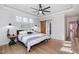 Large main bedroom with king bed, barn door, and ensuite bathroom at 257 Rawhide Dr, Louisburg, NC 27549