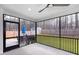Screened porch overlooking backyard with wooden fence at 257 Rawhide Dr, Louisburg, NC 27549