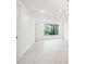 Bright bedroom space featuring a large window and hardwood floors at 29 Enterprise St # 107, Raleigh, NC 27607