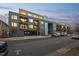 Modern apartment building featuring a secure parking garage and inviting balcony spaces at 29 Enterprise St # 107, Raleigh, NC 27607