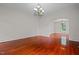Elegant dining room showcasing hardwood floors and an arched doorway at 309 Hawkins Ave, Sanford, NC 27330