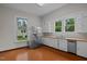 Kitchen with stainless steel appliances and white cabinets at 309 Hawkins Ave, Sanford, NC 27330