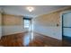 Bright bedroom featuring hardwood floors and large windows at 3129 Barwell Rd Rd, Raleigh, NC 27610