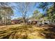Ranch house with a large backyard and mature trees at 3129 Barwell Rd Rd, Raleigh, NC 27610