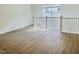 Upstairs loft boasts natural light and wood flooring, perfect for a cozy sitting area at 3284 Roundly Rd # 16, New Hill, NC 27562