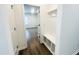 Convenient mudroom with built-in storage and seating, plus a coat rack for added organization at 3284 Roundly Rd # 16, New Hill, NC 27562