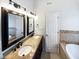 Bathroom with double vanity and granite countertop at 3321 Beech Bluff Ln, Raleigh, NC 27616