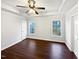 Bright bedroom with hardwood floors and large windows at 3321 Beech Bluff Ln, Raleigh, NC 27616