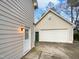 Attached garage with extra storage space at 3321 Beech Bluff Ln, Raleigh, NC 27616