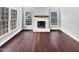 Living room with hardwood floors and a fireplace at 3321 Beech Bluff Ln, Raleigh, NC 27616