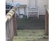 Wooden deck with rocking chair and small table at 4053 Little Creek Church Rd, Clayton, NC 27520