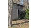 Rustic shed with a weathered door at 4053 Little Creek Church Rd, Clayton, NC 27520