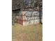 Rustic shed with rusty metal siding at 4053 Little Creek Church Rd, Clayton, NC 27520