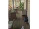 Long wooden porch with brick columns and storage boxes at 4053 Little Creek Church Rd, Clayton, NC 27520