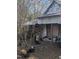 Rustic wooden storage shed with corrugated metal roof at 4053 Little Creek Church Rd, Clayton, NC 27520