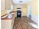Galley kitchen with wood countertops and dark flooring at 509 Mullins St, Rocky Mount, NC 27803
