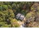 Aerial view of house nestled in woods with large backyard at 6328 Bissette Rd, Wendell, NC 27591