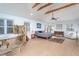 Spacious main bedroom with a stone jacuzzi tub and ceiling fan at 6328 Bissette Rd, Wendell, NC 27591