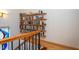 Wooden shelving unit with various books and items at 6328 Bissette Rd, Wendell, NC 27591