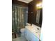 Clean bathroom with shower/tub combo, white vanity, and green shower curtain at 6369 New Market Way, Raleigh, NC 27615