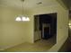 Dining room with view into living room with fireplace at 6369 New Market Way, Raleigh, NC 27615