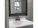 Bathroom featuring a modern vanity and mirror at 7317 Bentley Wood Ln, Raleigh, NC 27616