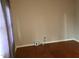 Living room with hardwood floors and neutral walls at 7317 Bentley Wood Ln, Raleigh, NC 27616