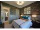 Bright bedroom with ensuite bathroom and decorative wallpaper at 82 Byrd Ln, Pittsboro, NC 27312