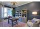 Home office with built in shelving and large window at 82 Byrd Ln, Pittsboro, NC 27312