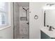 Updated bathroom with a walk-in shower and vanity at 902 Cobb Ct, Sanford, NC 27330