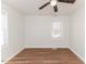 Bright bedroom with ceiling fan and hardwood flooring at 902 Cobb Ct, Sanford, NC 27330