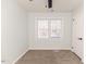 Bedroom with carpet, ceiling fan and two windows at 902 Cobb Ct, Sanford, NC 27330
