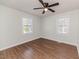 Bright bedroom with ceiling fan and hardwood flooring at 902 Cobb Ct, Sanford, NC 27330